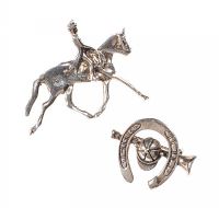 A DUO OF STERLING SILVER BROOCHES IN AN EQUESTRIAN THEME at Ross's Online Art Auctions