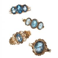 ASSORTED 9CT GOLD AND BLUE TOPAZ RINGS (FOUR IN NUMBER) at Ross's Online Art Auctions