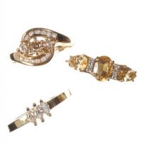 ASSORTED 9CT GOLD RINGS WITH YELLOW TONED SETTINGS (THREE IN NUMBER) at Ross's Online Art Auctions