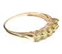 9CT GOLD RING SET WITH FIVE PERIDOTS IN A CLAW SETTING at Ross's Online Art Auctions
