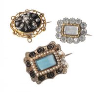 AN ASSORTMENT OF METAL MOURNING BROOCHES (THREE IN NUMBER) at Ross's Online Art Auctions