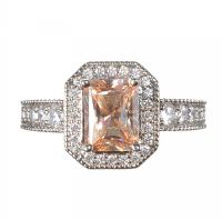 STERLING SILVER SIMULATED PADPARADSCHA SAPPHIRE AND CUBIC ZIRCONIA RING at Ross's Online Art Auctions