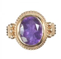 9CT GOLD RING SET WITH AN AMETHYST IN A BEZEL SETTING at Ross's Online Art Auctions