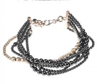 STERLING SILVER BRACELET SET WITH HEMATITE AND WHITE METAL BEADS at Ross's Online Art Auctions
