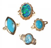 ASSORTED 9CT GOLD TURQUOISE, OPAL DOUBLET AND TOPAZ RINGS OF VARIOUS SIZES (FOUR IN NUMBER) at Ross's Online Art Auctions