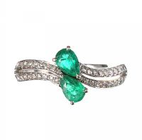 18CT WHITE GOLD EMERALD AND DIAMOND TWIST RING at Ross's Online Art Auctions