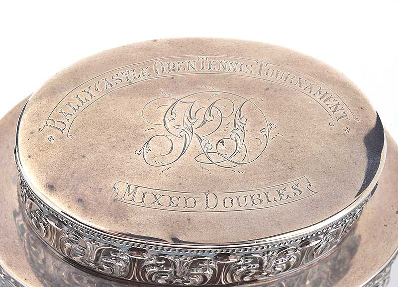 EMBOSSED SILVER OVAL SHAPED TEA CADDY WITH AN OVAL SHAPED LID - BIRMINGHAM 1905 at Ross's Online Art Auctions