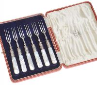 A SET OF SIX BOXED SILVER-PLATED DESSERT FORKS WITH MOTHER-OF-PEARL HANDLES at Ross's Online Art Auctions