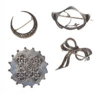AN ASSORTMENT OF SILVER BROOCHES FOUR IN NUMBER at Ross's Online Art Auctions