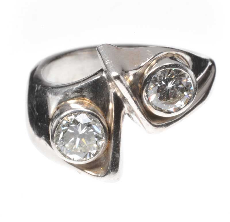 PLATINUM AND DIAMOND TWO STONE RING BY THE DESIGNER GRAHAM HARRON at Ross's Online Art Auctions