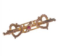 9CT GOLD PIERCED BAR BROOCH WITH HEARTS AND SET WITH RUBY AND SEED PEARLS at Ross's Online Art Auctions