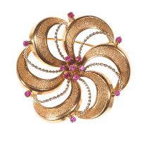18CT GOLD PIERCED FLORAL BROOCH SET WITH RUBIES at Ross's Online Art Auctions