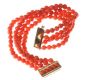 FOUR STRAND CORAL BRACELET WITH 14CT GOLD CLASP AND SPACERS at Ross's Online Art Auctions