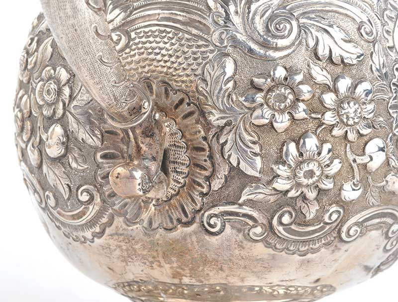 IRISH EMBOSSED SILVER COFFEE POT at Ross's Online Art Auctions