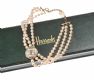 1980'S TRIPLE STRAND OF FAUX PEARLS WITH CRYSTAL AND GOLD-TONE METAL DETAILING FROM HARRODS OF LONDON at Ross's Online Art Auctions