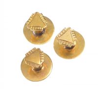 SET OF THREE GOLD-TONE METAL STUDS at Ross's Online Art Auctions