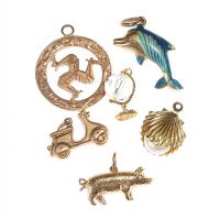 ASSORTMENT OF FOUR 9CT GOLD AND TWO GOLD-TONE METAL CHARMS at Ross's Online Art Auctions