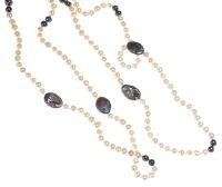 LONG STRAND OF FRESHWATER PEARLS at Ross's Online Art Auctions