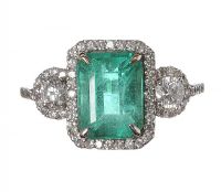 18CT WHITE GOLD EMERALD AND DIAMOND TRIPLE CLUSTER RING at Ross's Online Art Auctions