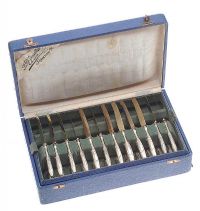 BOXED SET OF 12 SILVER-MOUNTED LOBSTER KNIVES AND FORKS at Ross's Online Art Auctions