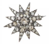 ANTIQUE STERLING SILVER AND PASTE STARBURST BROOCH at Ross's Online Art Auctions