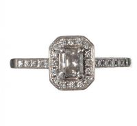 PLATINUM AND DIAMOND HALO RING at Ross's Online Art Auctions