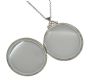 STERLING SILVER ENGRAVED CIRCULAR LOCKET AND CHAIN at Ross's Online Art Auctions
