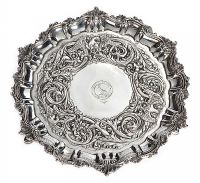 CIRCULAR EMBOSSED IRISH SILVER CARD SALVER at Ross's Online Art Auctions
