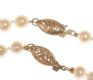 CULTURED PEARL NECKLACE AND BRACELET SUITE WITH 9CT GOLD CLASPS at Ross's Online Art Auctions