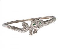 STERLING SILVER AND CUBIC ZIRCONIA PANTHER BANGLE IN THE STYLE OF CARTIER at Ross's Online Art Auctions