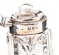 STERLING SILVER AND CUT-GLASS PERFUME BOTTLE at Ross's Online Art Auctions