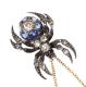 18CT GOLD SAPPHIRE AND DIAMOND SPIDER PENDANT AND CHAIN at Ross's Online Art Auctions