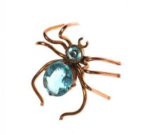 9CT GOLD SPIDER CHARM SET WITH BLUE CRYSTAL at Ross's Online Art Auctions