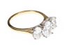 18CT GOLD AND DIAMOND THREE STONE RING OF EXCELLENT COLOUR at Ross's Online Art Auctions