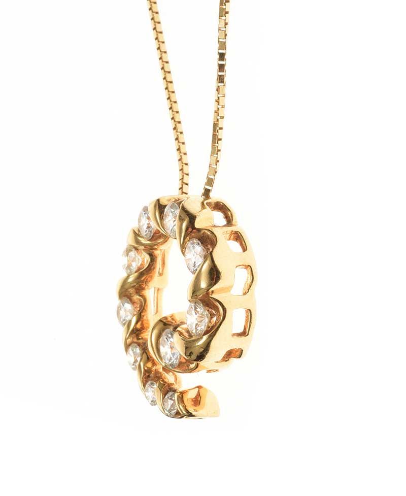 18CT GOLD DIAMOND PENDANT AND CHAIN at Ross's Online Art Auctions