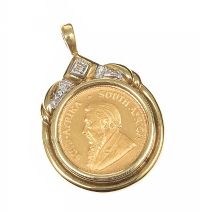 9CT GOLD MOUNTED COIN at Ross's Online Art Auctions