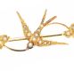 15CT GOLD SEED PEARL SWALLOW BROOCH at Ross's Online Art Auctions