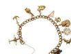 9CT GOLD CHARM BRACELET PLUS TWO 9 CT GOLD CHARMS at Ross's Online Art Auctions