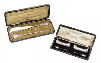 PAIR OF SILVER SALT CELLARS AND SPOONS IN THE STYLE OF A CANOE IN ORIGINAL BOX ALONG WITH A CASED SILVER HANDLED SHOE HORN, BUTTON HOOK AND SMALL HOOK at Ross's Online Art Auctions