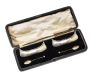 PAIR OF SILVER SALT CELLARS AND SPOONS IN THE STYLE OF A CANOE IN ORIGINAL BOX ALONG WITH A CASED SILVER HANDLED SHOE HORN, BUTTON HOOK AND SMALL HOOK at Ross's Online Art Auctions
