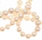 LONG STRAND OF FRESH WATER PEARLS WITH SILVER TONE CRYSTAL-SET PENDANT at Ross's Online Art Auctions