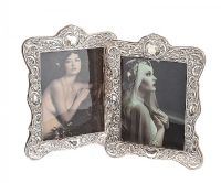PAIR OF SILVER PHOTOGRAPH FRAMES at Ross's Online Art Auctions