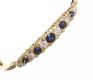 18CT GOLD SAPPHIRE AND DIAMOND BANGLE at Ross's Online Art Auctions