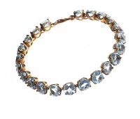 GOLD-PLATED STERLING SILVER BRACELET SET WITH BLUE TOPAZ at Ross's Online Art Auctions