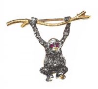 SILVER AND HIGH CARAT GOLD RUBY AND DIAMOND MONKEY BROOCH at Ross's Online Art Auctions
