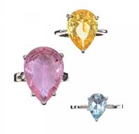 THREE SILVER-TONE METAL AND COLOURED CRYSTAL DRESS RINGS at Ross's Online Art Auctions