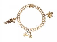 14CT GOLD CHARM BRACELET WITH THREE CHARMS at Ross's Online Art Auctions