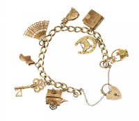 9CT GOLD CHARM BRACELET AND A LOOSE CHARM at Ross's Online Art Auctions