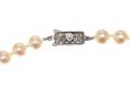 MIKIMOTO STRAND OF CULTURED PEARLS WITH PIERCED SILVER CLASP at Ross's Online Art Auctions