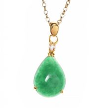 GOLD JADE AND CUBIC ZIRCONIA PENDANT ON A 9CT GOLD CHAIN at Ross's Online Art Auctions